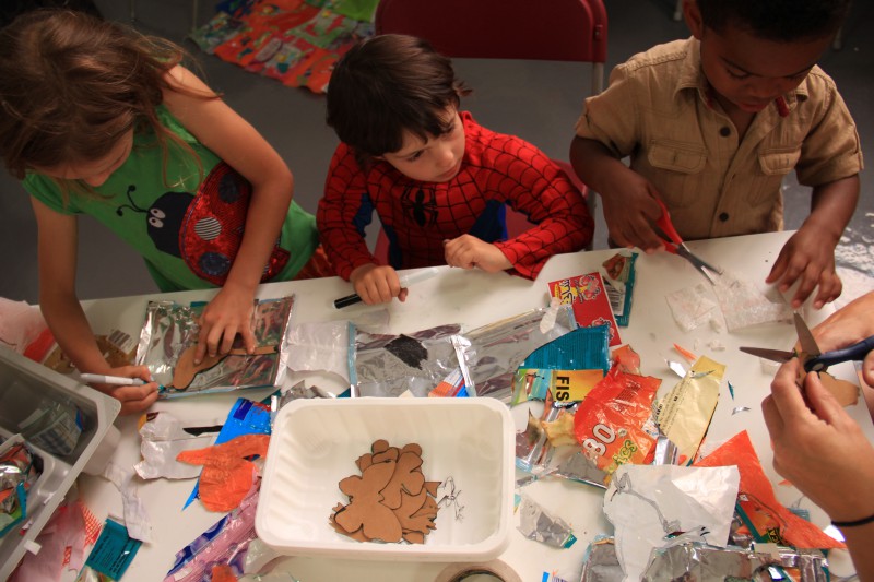 Kids having fund during a LitterARTi creative educational workshop creating an"un"comfort blanket with Fiona Hobson and Jethro Brice at Trinity during our Waste of Space Exhibition.